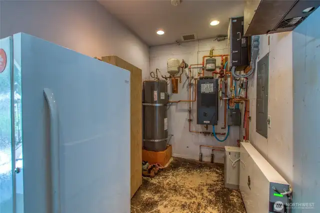 The mechanical room has leads to the carport for a more casual entrance into the home.