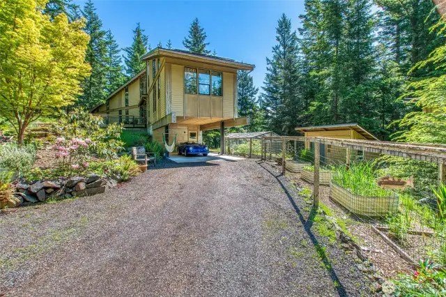 The gravel driveway provides plenty of extra parking.