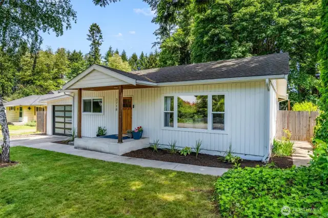 Home features welcoming covered front porch