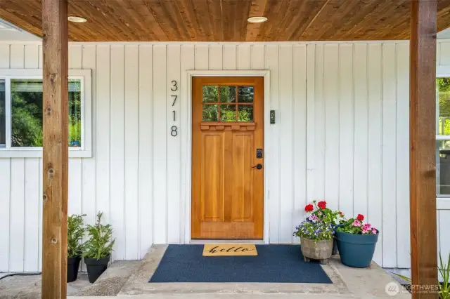 Home features welcoming covered front porch