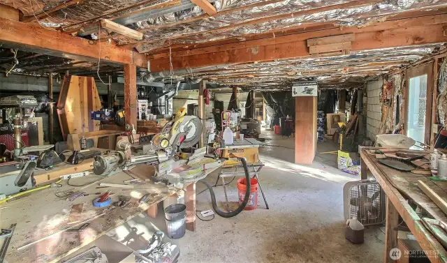 Front Left of the 1590 sq ft basement with full of possibilities. 40' Steel beam can be laid out to make one large room with enough ceiling height