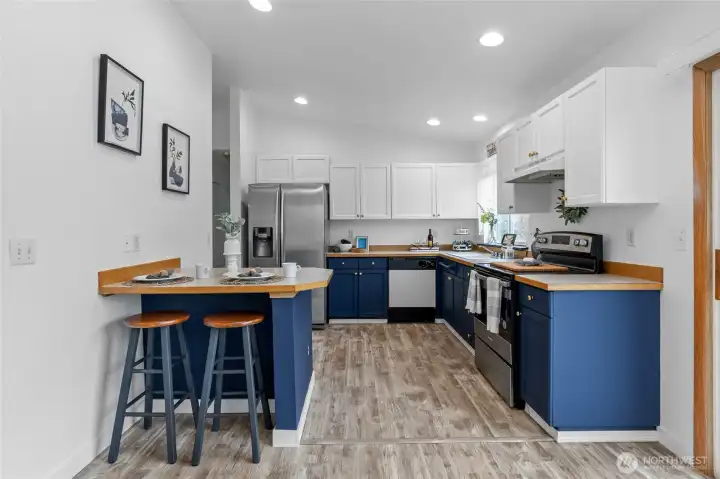 Fresh paint on kitchen cabinets.