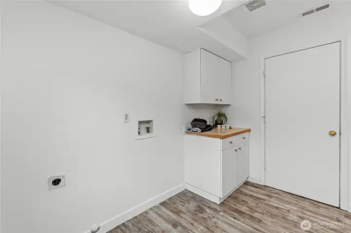 Space for washer and dryer.