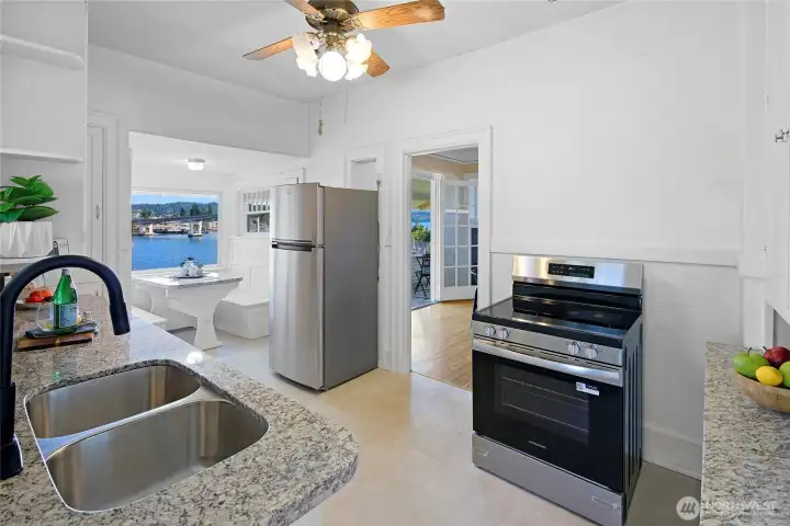 Kitchen with quartz counters and new appliances