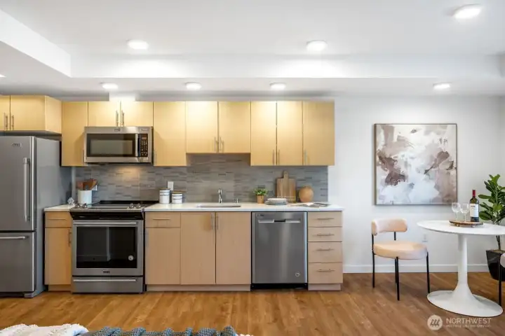 Sleek modern kitchen with granite counters and stainless steel