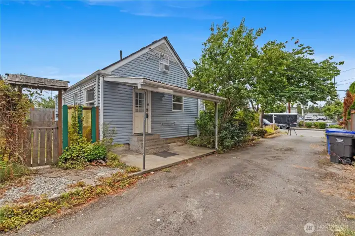 Side entrance to utility room, perfect for a mudroom.