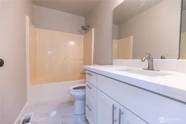 Min upstairs bath with fiberglass tub/shower combo