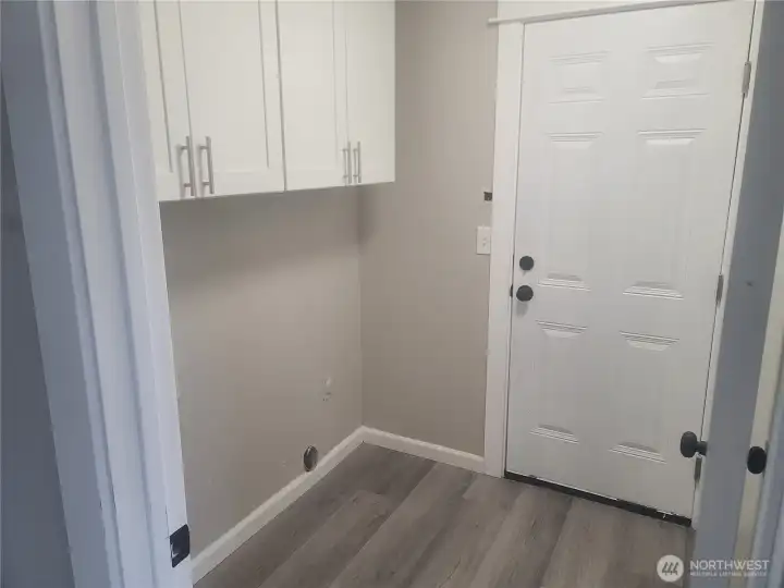 Utility room with access to the garage