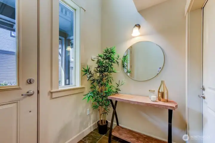 Entry with Garage entrance door. Garagei is oversized tandem with extra storage