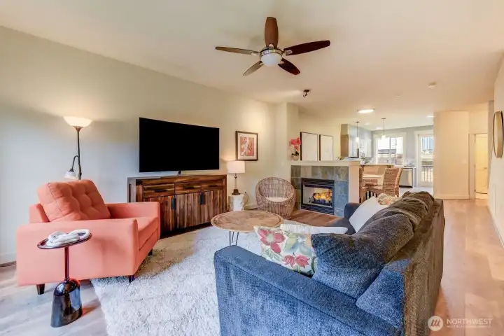 light and bright Living area with 2 sided fireplace