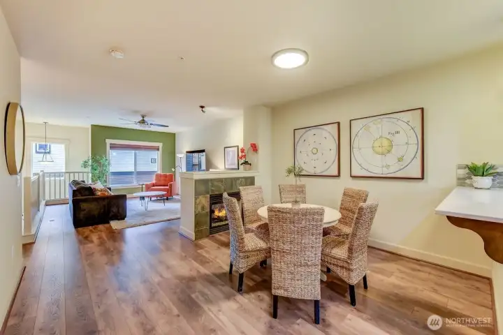 Looking out from the kitchen over dining area and living area (double sided gas fireplace)