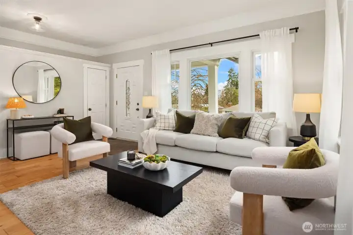 Warm and open living room featuring new Anderson windows and eastern exposure.