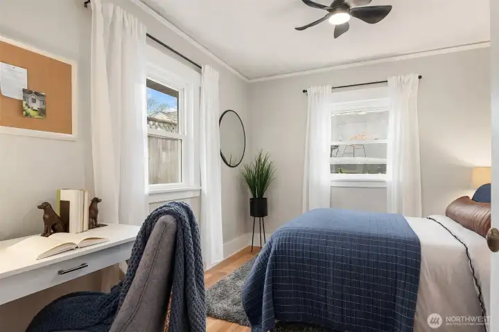 Main floor SW bedroom features new windows as well.