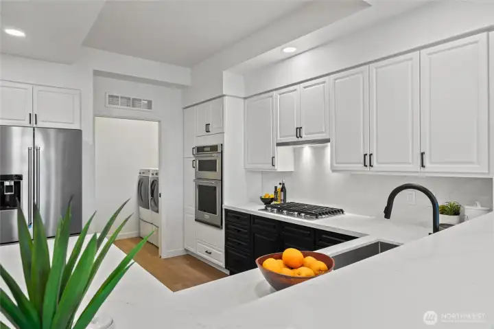 Beautfuly updated chefs kitchen with new appliances, countertops and fixtures