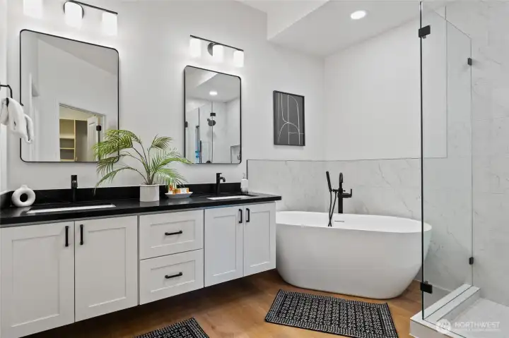 Double cantilevered sinks, soaking tub, and large shower
