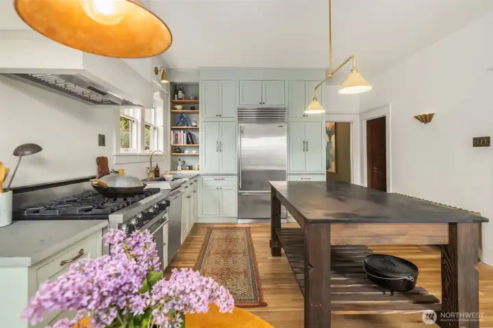 The fabulous slate topped French prep table stays with the home!