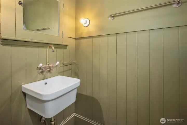 The toilet and sink are separate from the Wet Room.