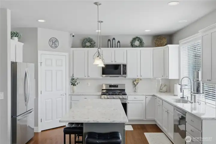 Professionally refinished cabinetry.