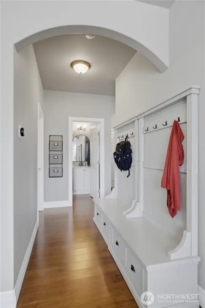 Entryway from garage with built in storage.