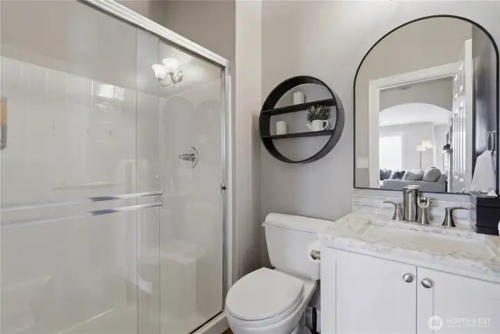 Main floor bathroom with shower for bedroom on main.