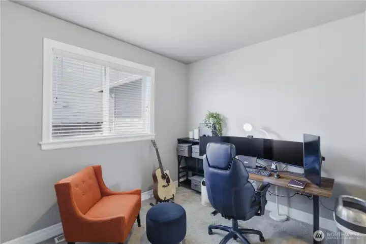 Main floor bedroom or office. Down the hall.