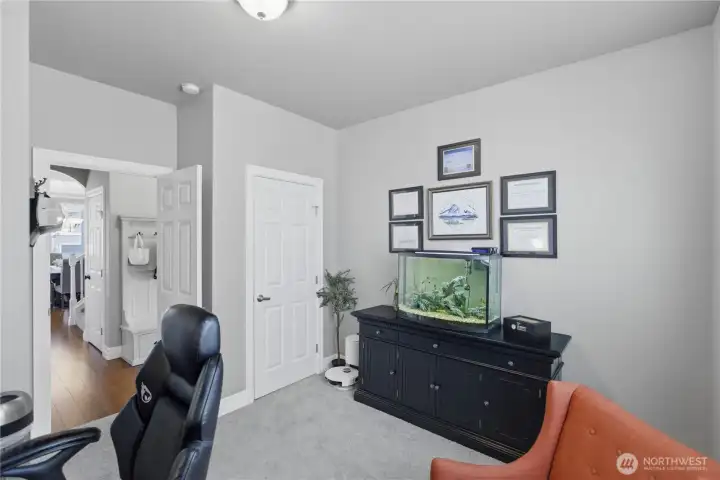 Main floor bedroom or office. Down the hall.