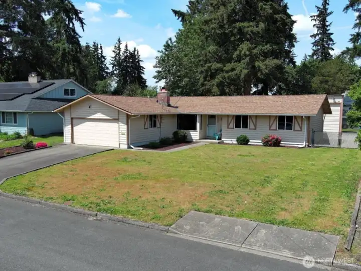 Welcome to this classic mid-century rambler tucked into Auburn’s peaceful Forest Villa neighborhood.