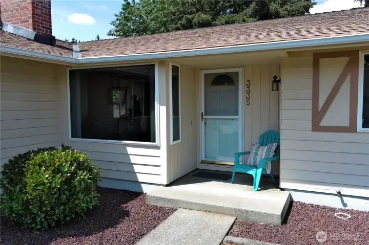 Designed with the PNW in mind, the covered entry keeps guests and packages protected.