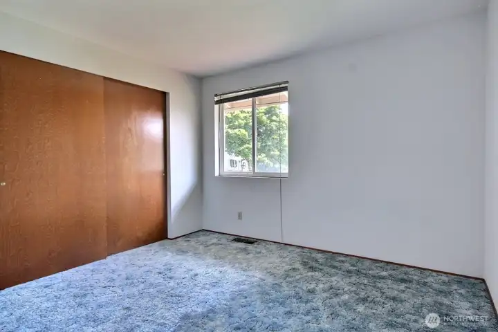 Bedroom #2 overlooks the front yard.