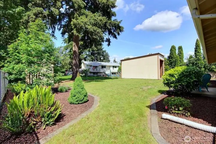 Enjoy beautifully landscaped yard that is low maintenance and offers lots of established perennials.