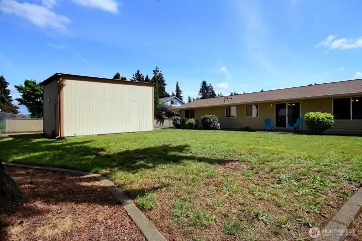 The detached 24’ x 12’ shop/garage is a dream setup for car enthusiasts, hobbyists, or extra storage needs.
