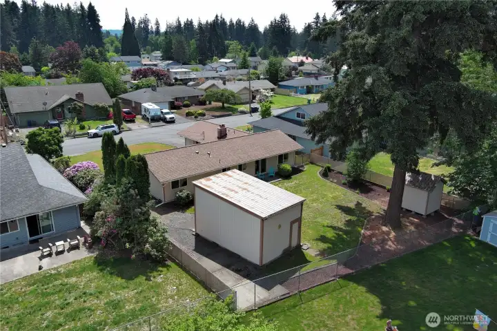Back view of detached garage/shop where dedicated RV/boat parking is located