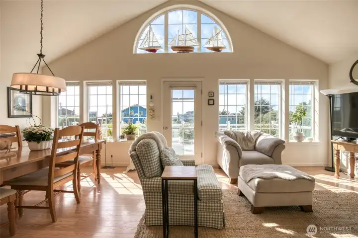 Large, open living area. Stay warm with the propane fireplace to the right.