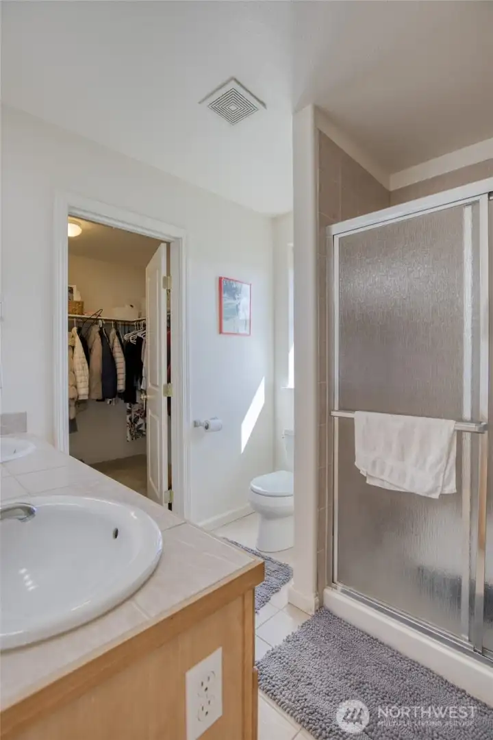 Closet steps into the bath.