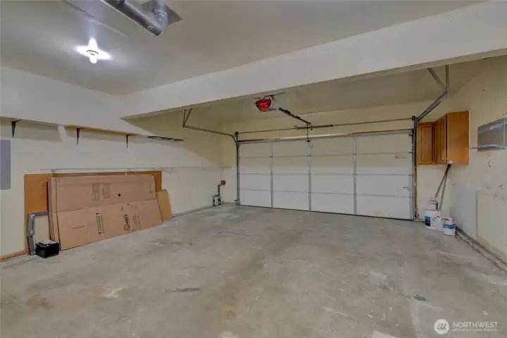 Extra cabinets  & room for a work bench