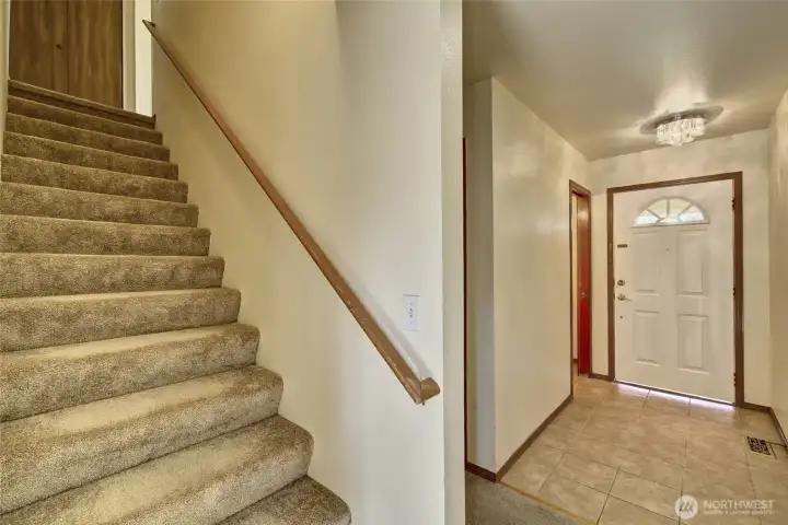 Entryway and stairs to 2nd level