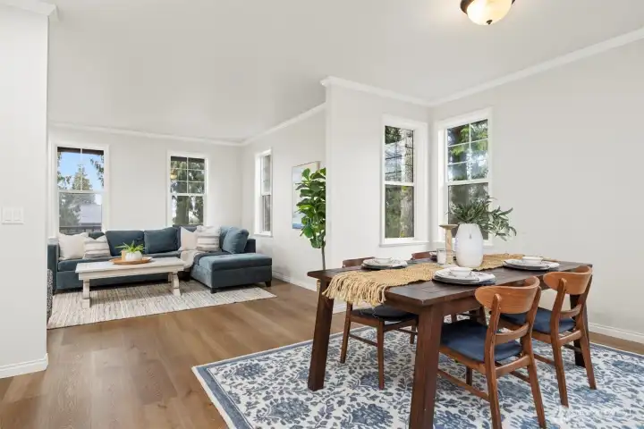 Effortless flow from the family room through the dining room keeps everyone connected at every gathering. Effortless flow from the family room through the dining room keeps everyone connected at every gathering.