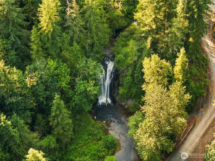 The waterfall’s sound carries to the home year-round.