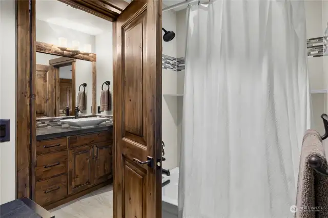 Tub/Shower combo in upper bathroom.