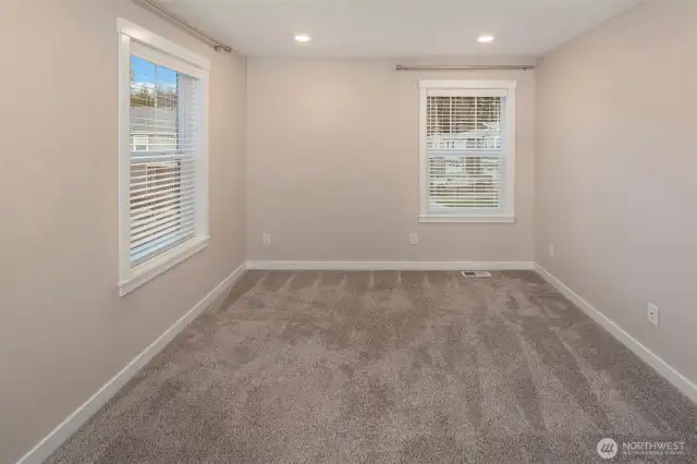 Loft at the top of the stairs is perfect for home office or extra entertaining space.