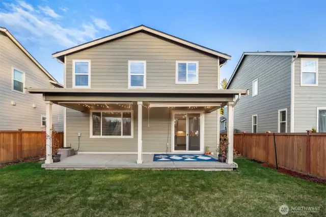 Covered porch extends the full of the patio.
