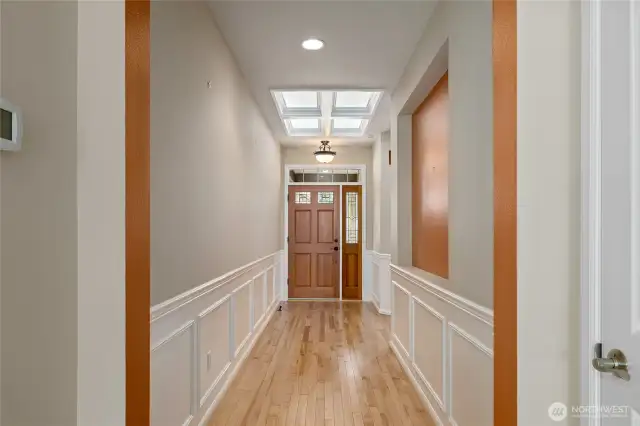 Wainscotting in the hallway and recessed areas to show off your favorite artwork.