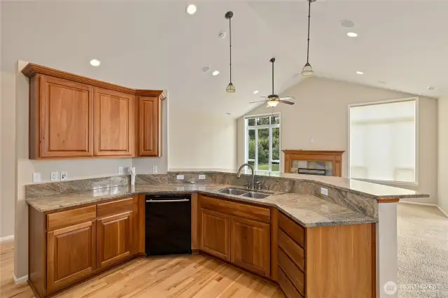 Kitchen offers plenty of counter space and a breakfast bar.