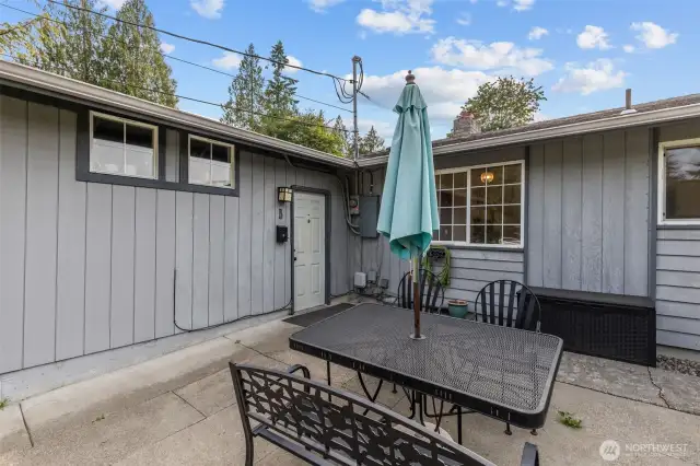 front patio leading to 2 family entrances