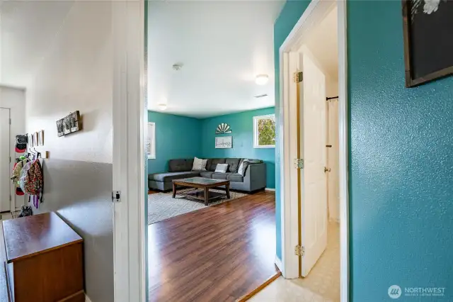 Family Room - off back hall utility room to the left and full bathroom to the right