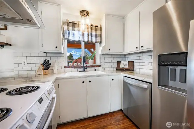 Kitchen was updated with new appliances, backsplash and countertops in 2020