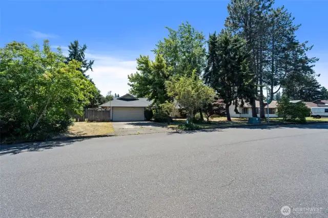 Large lot with ample extra space, perfect for additional parking.