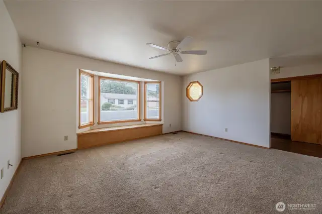 Living room window seat with cedar lined storage