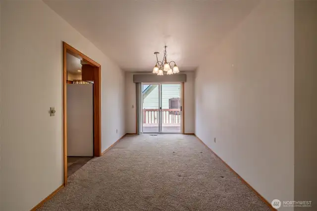 Dining room with slider to deck