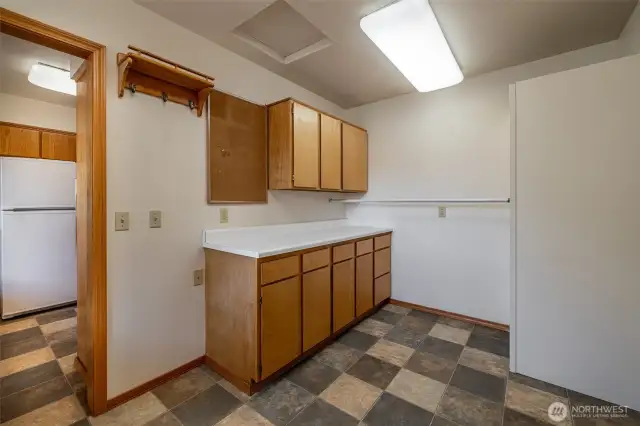 Laundry room with storage